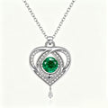 Emerald Radiance Interlocking Heart Pendant Necklace